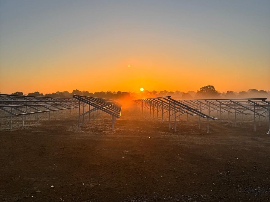 Ground-mount solar frames at dawn