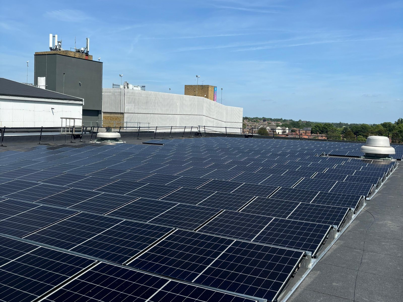 Completed rooftop solar array on a flat commercial roof